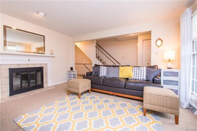 Living room measuring 16 x 12 with two floor-to-ce