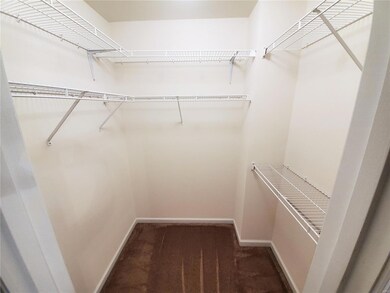 Oversized walk in closet in Master Bedroom
