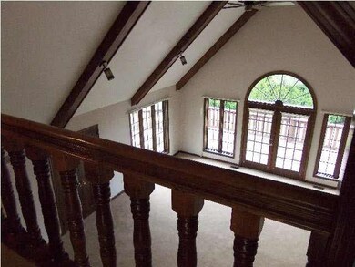 View of living room from upper level