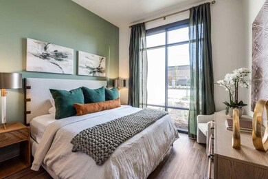 Bedroom featuring dark hardwood / wood-style floor