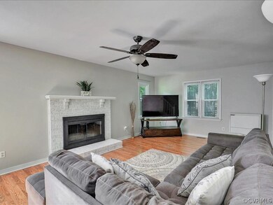 Family Room - freshly painted, gas fireplace, viny