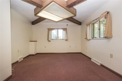 Den that is located on the main floor with a main 