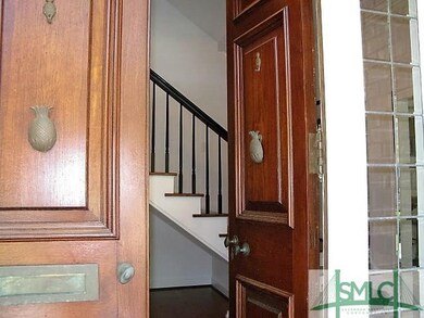 Grand entrance through these solid English walnut 