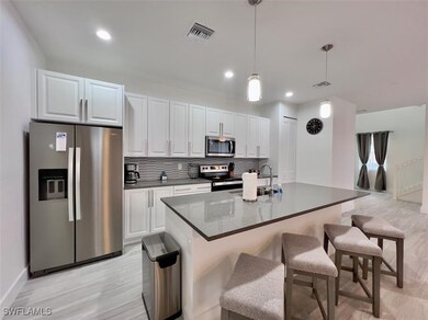 Kitchen featuring appliances with stainless steel