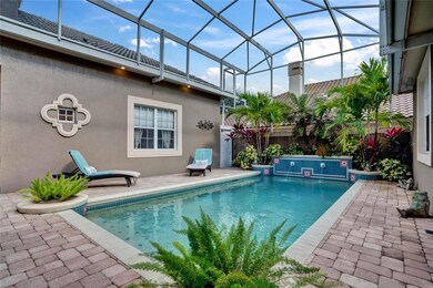 Enclosed courtyard pool with water feature