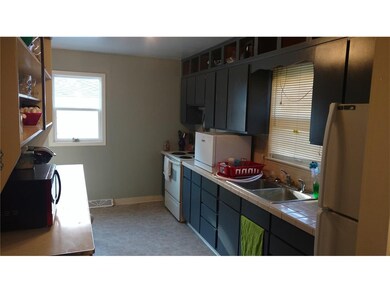 Plenty of cabinet space in the kitchen, where all 