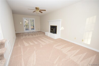 Large Family Room with Brick Fireplace and insert.
