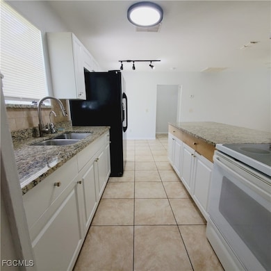 2433 Lola Ave S, Lehigh Acres, FL 33973 - photo 4