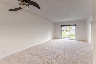 New carpet flooring in large and spacious living r
