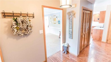 Beautiful, welcoming foyer with hardwood floors