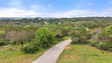 View of mountain backdrop with a heavily wooded a