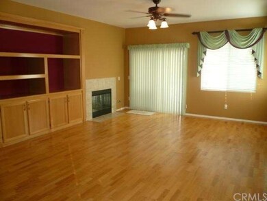 Great room with hardwood floors, built-in entertai