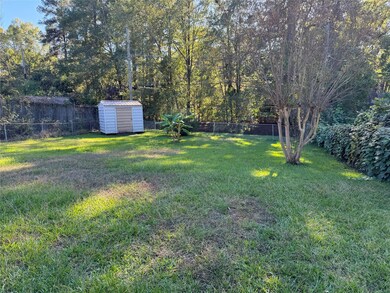 View of yard with a shed