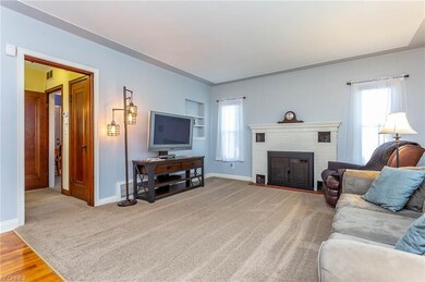 Living Room with fresh paint and carpet plus firep