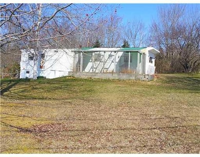 Exterior Front. Mobile home is...