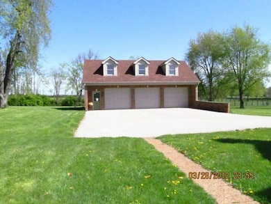 3 bay garage with floored space upstairs