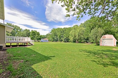 Over 1/3 acre with large shed
