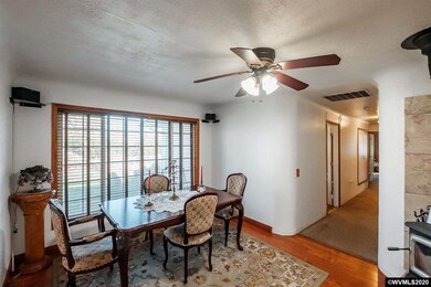 You can just see the certified wood stove that can heat the entire home.