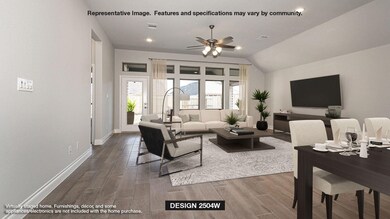 Living area with a ceiling fan, wood finished flo