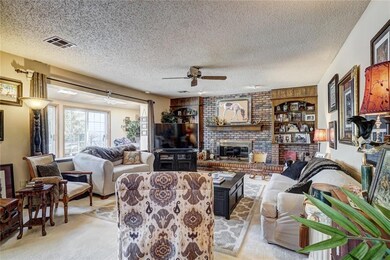 Formal living room with fireplace.