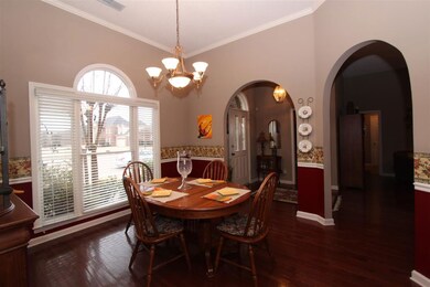 Nice dining room with lots of arches and natural l