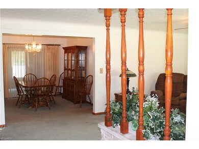 View of dining room and living room from front doo