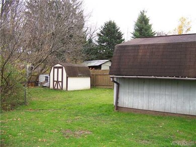Backyard sheds in backyard
