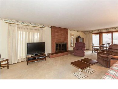 Living room with wood burning fireplace (gas start