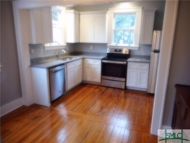 Kitchen with all new stainless appliances, cabinet