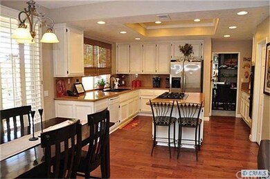 Kitchen with granite countertop and island