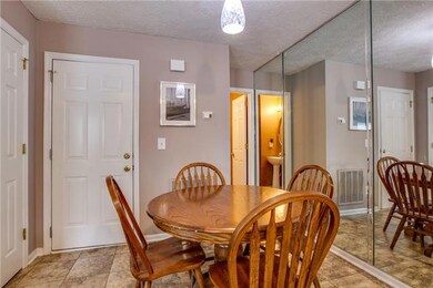 Dining area flooring was installed in February 2014. Downstairs has convenient access to attached garage.
