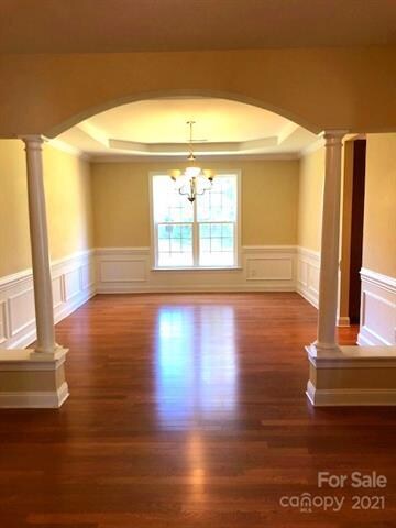 Grand Living to Dining Room
