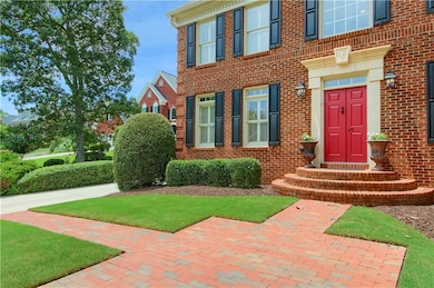 Entrance to property with brick siding