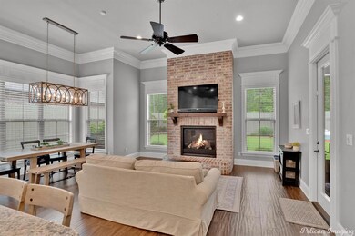 Hearth room open to kitchen and casual eating area