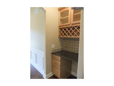 ...and a butlers pantry with granite countertop, w