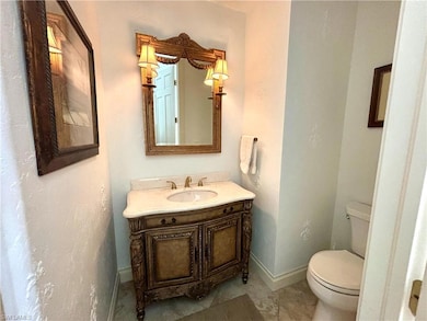 Powder room with toilet and vanity