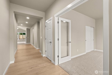 Greeted with hardwood floors at entry and run through to kitchen and dining room