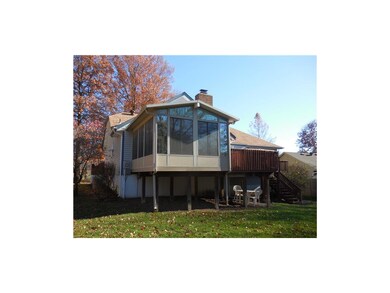 Back of home showing Sun Room.