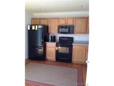 All Appliances Convey: Refrigerator, Electric Rang