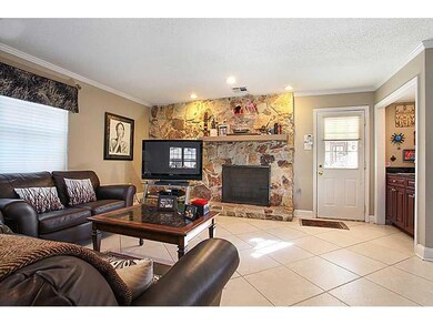 Den/Family/Great Room. Gas fireplace. Note wet bar