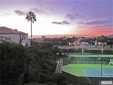 View of St. Regis Hotel over tennis courts from li