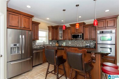 The recessed & red pendant lighting assures the mo