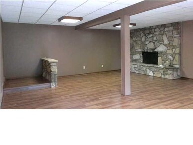 FAMILY ROOM 24'2 x 19'7 STONE FIREPLACE with Gas S