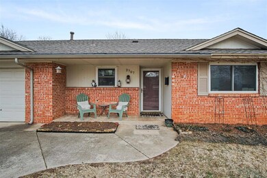 View of exterior entry featuring a garage