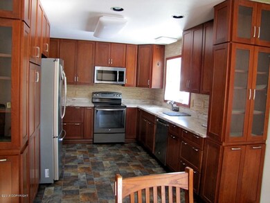 Cabinets featuring glass displays.