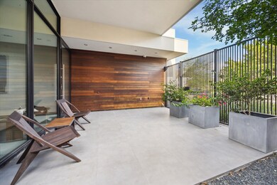 Another view of the gated front courtyard.