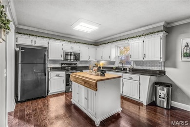 908 E Cottonwood Ln, Dexter, MO 63841 - photo 6