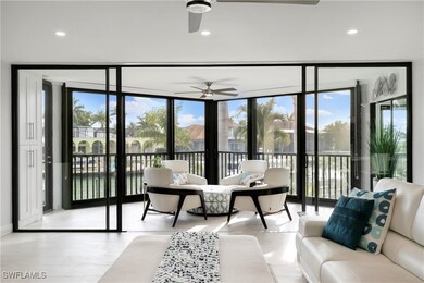 Living area featuring recessed lighting, a wall of