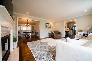 Living Rm. opens to Foyer and Dining Rm. and to Su