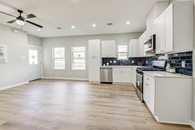 Unit B . Solid wood cabinets, soft-close drawers,
